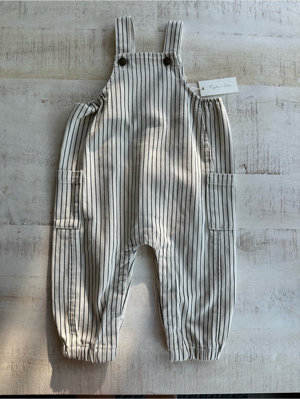 Rylee + Cru Cream Overalls with Navy Pinstripes